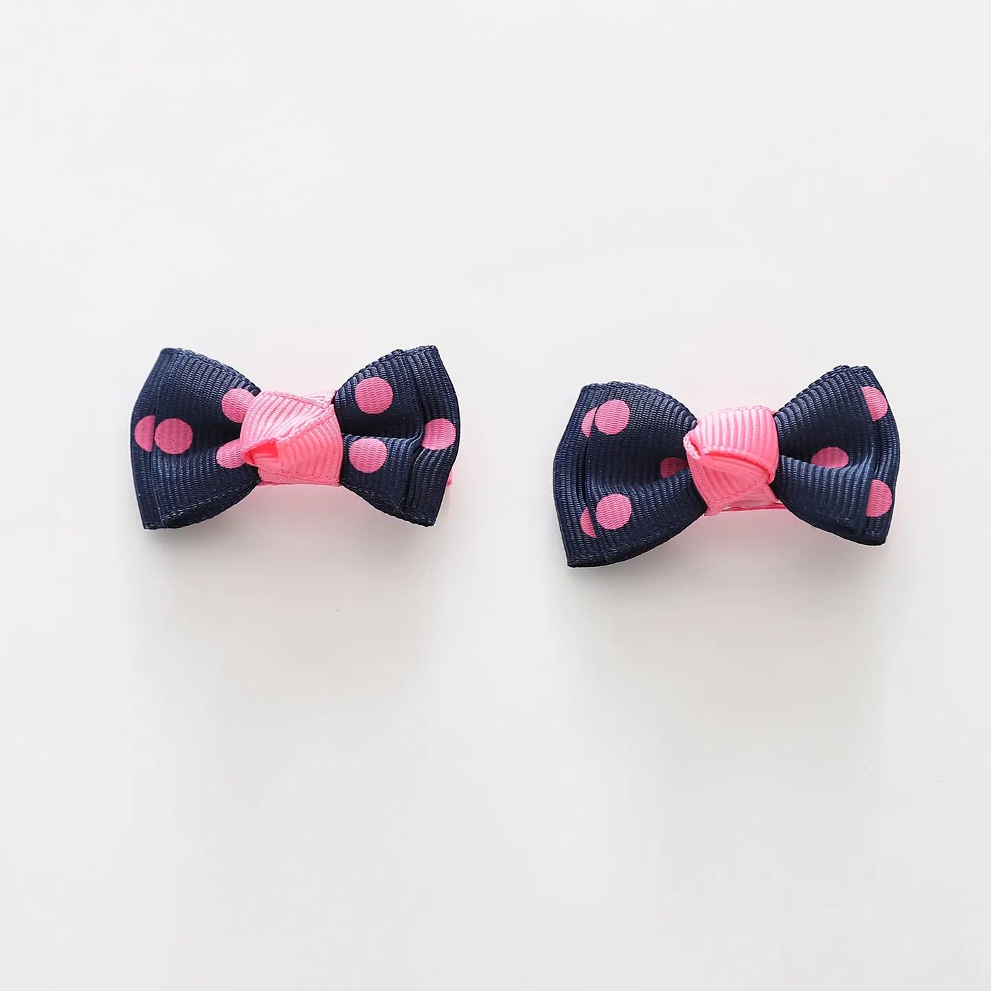 Navy and Pink Polka Dot Bow Hair Clips 2 Pack Ollies Place