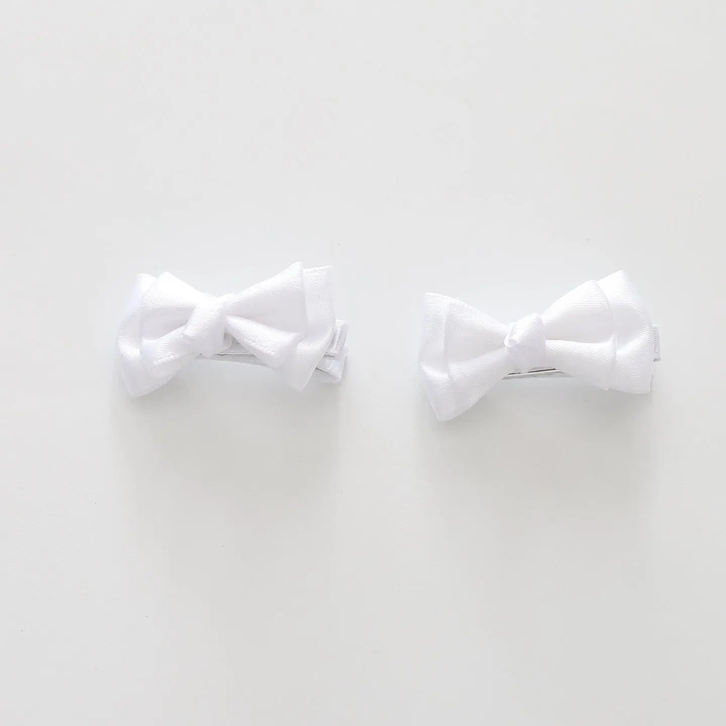 White Bow Hair Clips 2 Pack Ollies Place