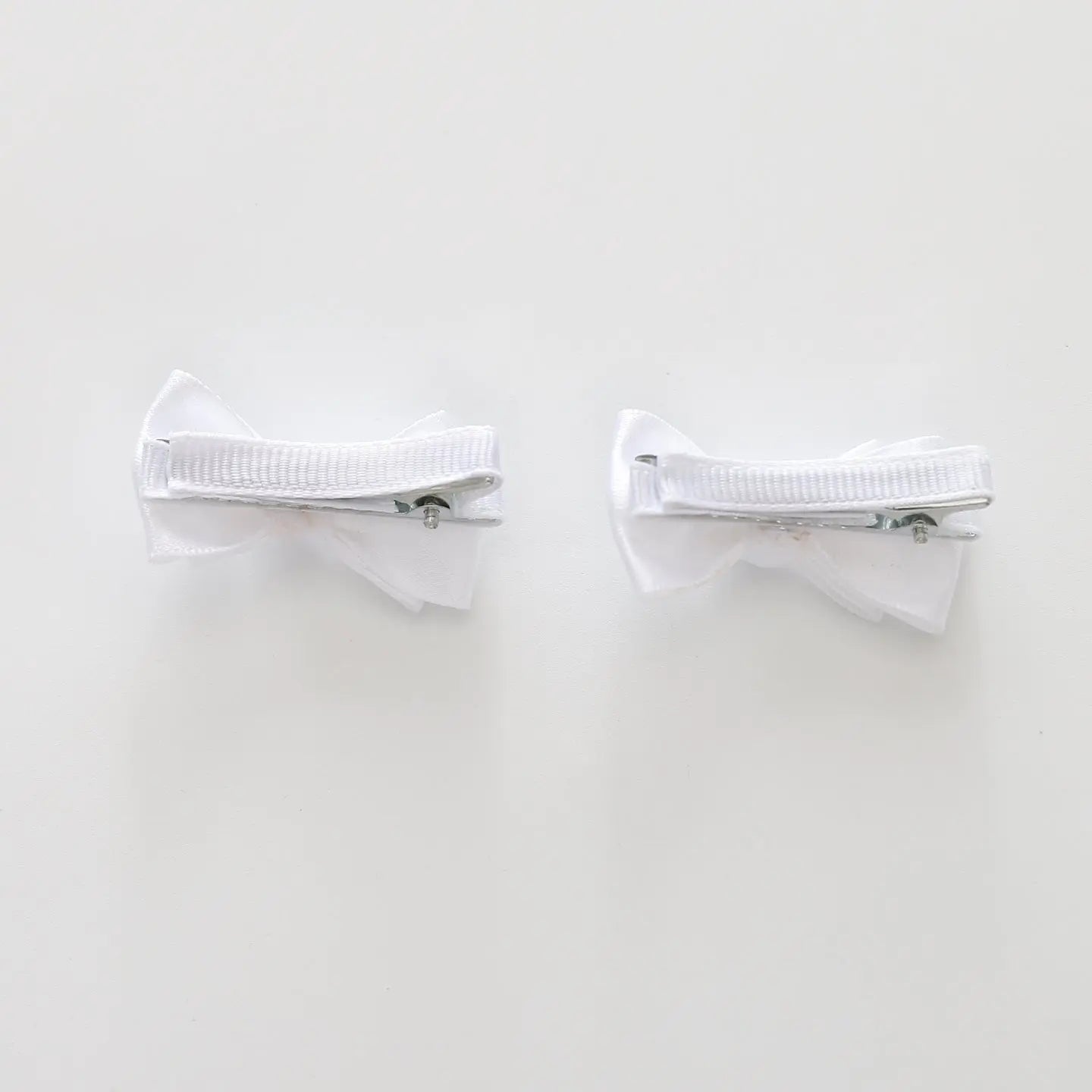 White Bow Hair Clips 2 Pack Ollies Place